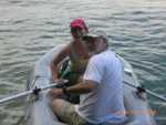 dinghying from dock to boats on mooring line