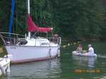 dinghying from dock to boats on mooring line