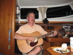 Robert Banks serenading crew of Last Wish in Baltimore