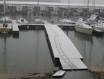 Looks like the sailor had a little too much to drink..

Shouldn't drink and drive dock carts!