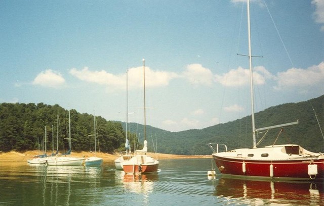 Why don't they all point the same way?  The houseboaters loved going through the lineup to get out.. (1980)