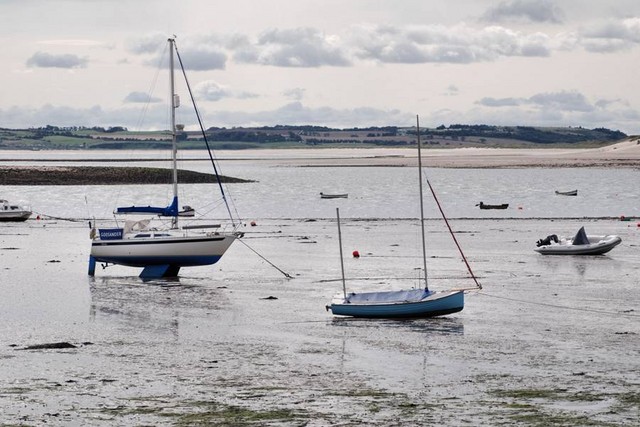 Lindisfarne (Holy Island), NE coast of England, south of Scottish border; island at high tide, causeway at low tide; Early Celtic Christian site dating back to 600's when missionaries from Ireland/Scotland settled there an established a monastery.