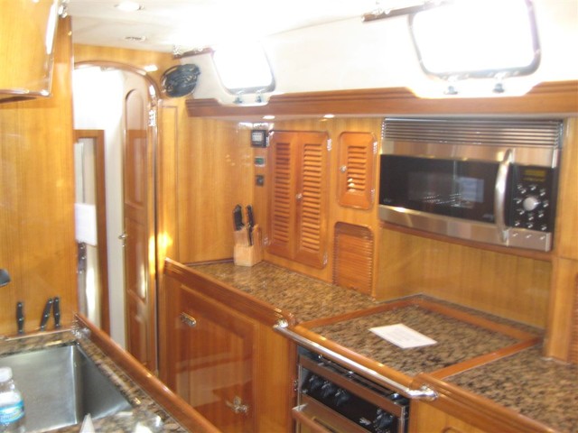Adair could fix a meal for our whole club here (galley of Hylas 70)