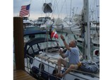 Questions answered, $150 paid, passport is stamped, cruising permit in hand; up goes the Bahamian Courtesy flag.