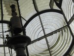 Five lenses, 50 mm mantle (now Coleman), four tons of equipment floating in a round trough of mercury, moved by brass clockwork.