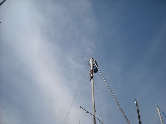 Russ Veldman mounting tacktick instrumentation with help of some other sailors.. (pics by Mark Galloway)