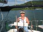 Sandra at helm of Wild Blue Yonder