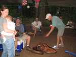 Pig Roast, Robert picking up a little cash to pay for meal..