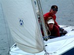 Skip and Patty during race on Soling