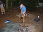 Getting the coals ready for the pig..