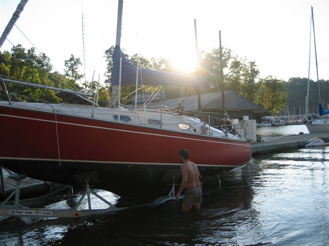 Jeff Arnfield watches as Windward pulled from lake