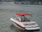 Transporting people from Lakeshore marina to picnic site on point