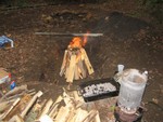 getting the fire started for pig roast