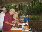 carving up the meat for the meal