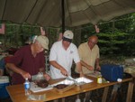 carving up the meat for the meal