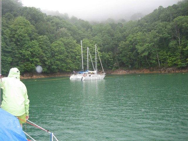 Boats tying up on buoy line