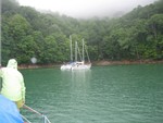 Boats tying up on buoy line