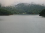 clouds lifting in valley