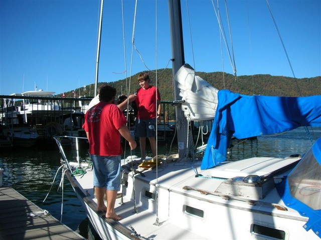 Josh in the bosun's seat on Sam's boat