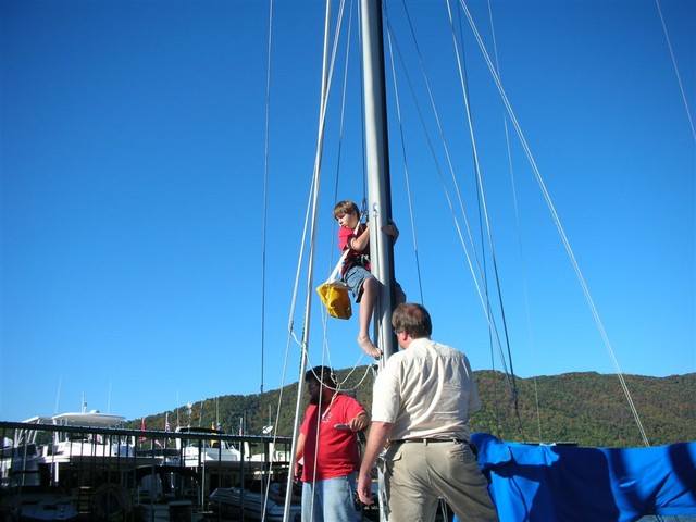 Josh in the bosun's seat on Sam's boat