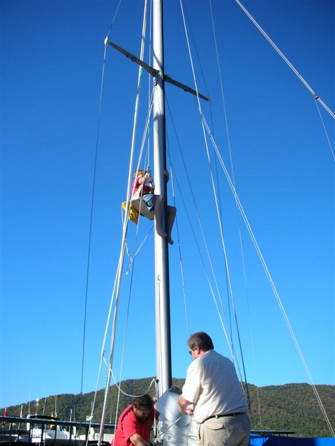 Josh in the bosun's seat on Sam's boat