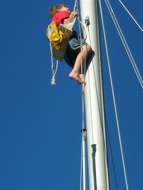 Josh in the bosun's seat on Sam's boat