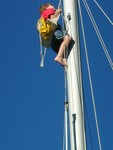 Josh in the bosun's seat on Sam's boat
