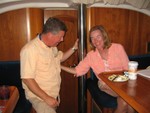 Robert telling Sandra another funny story..