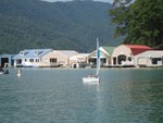 Sandra Little sailing dinghy in harbor of Lake Shore Marina..