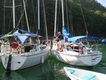 Circling to attach to buoy line in cove near dam
