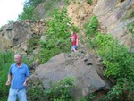 Bill Murdoch and Josh harvesting wild strawberries near top of dam, also found wild peaches..