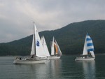 Hope the Merit got a steep discount on the spinnaker, however, he did come in first!