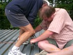 Sat July 21, 2008, screwing down the subdeck..
(Picture submitted by C. Lucas)