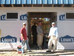 Nov 1, working on door installation, siding, soffits, siding on south side, etc