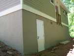 two coats stucco completed and painted (May 9, 2009)