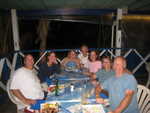 satisfied sailors at Foxy's Taboo, Jost Van Dyke, restaurant supplied insect spray!