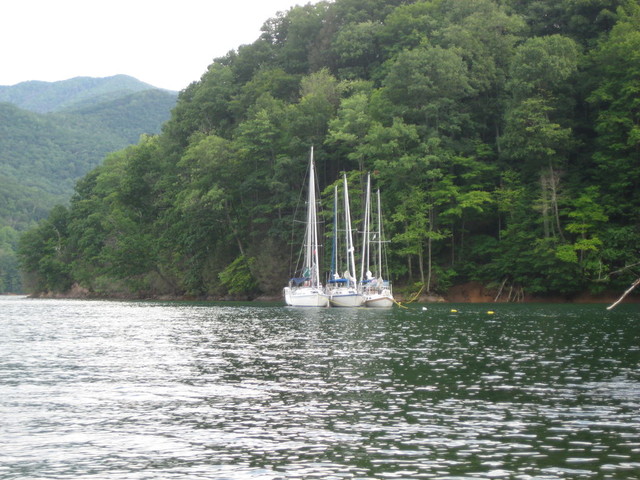 view from dinghy going ashore to climb to dam
