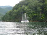 view from dinghy going ashore to climb to dam