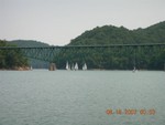 Boats pass under bridge for finish (picture by Mark Galloway)