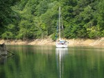 The morning after overnighter, first boat "weighs anchor"