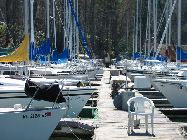 View of old dock, gone are the days where you could be sitting in a chair, the dock gives way, and you find yourself in the water!  

Or even worse, a storm comes and breaks the dock into two pieces and your boat is still attached!  

Picture from Clarke Lucas